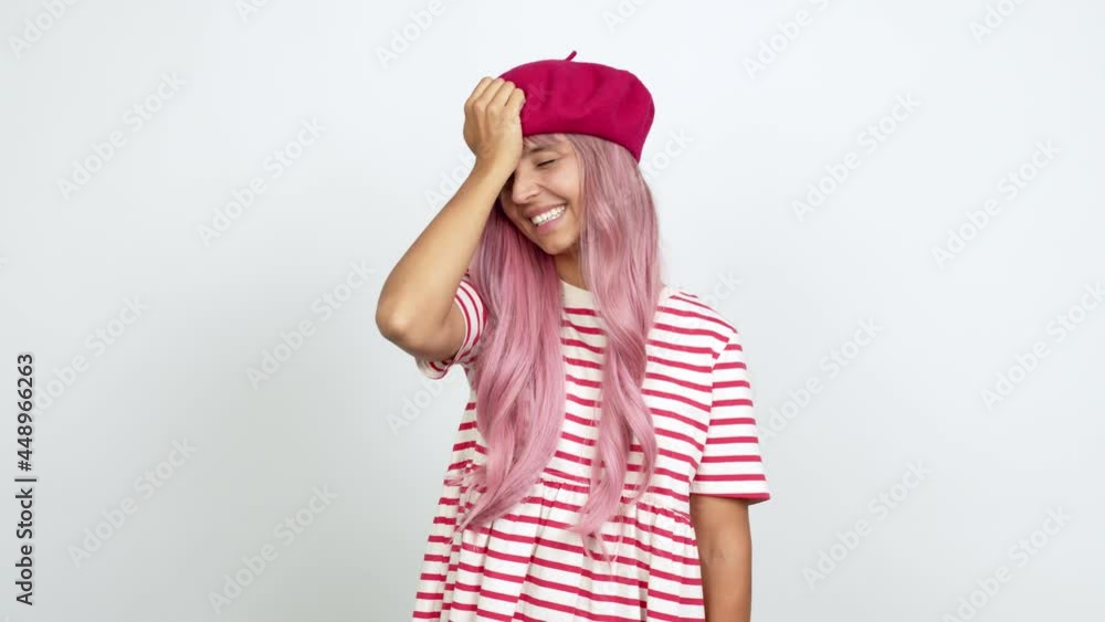 Young woman with pink hair intending to realizes the solution while lifting a finger up over isolated background Young woman with pink hair intending to realizes the solution while lifting a finger up over isolated background
