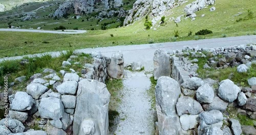 CORUM, TURKEY - Jul 07, 2021: A low drone view of Lion Gate in Hattusa Hattite ancient city in Turkey - bronze age