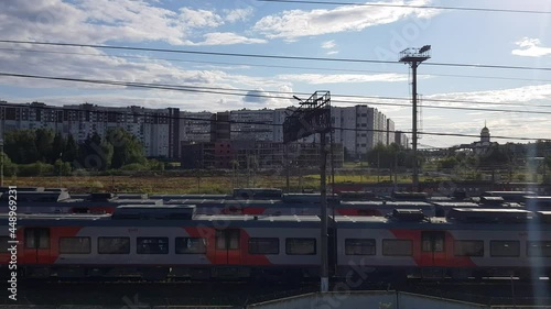 The view from the window of the train passing passenger railway station