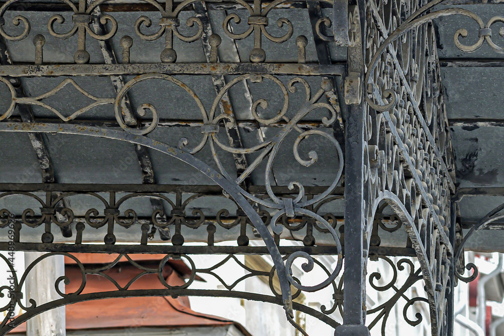 A fragment of a cast-iron porch of a historical building