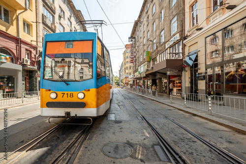 Photographing trams in the middle of the road in the center of city of Sofia in Bulgaria
