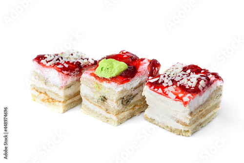 Slice of berry cake isolated on white background.