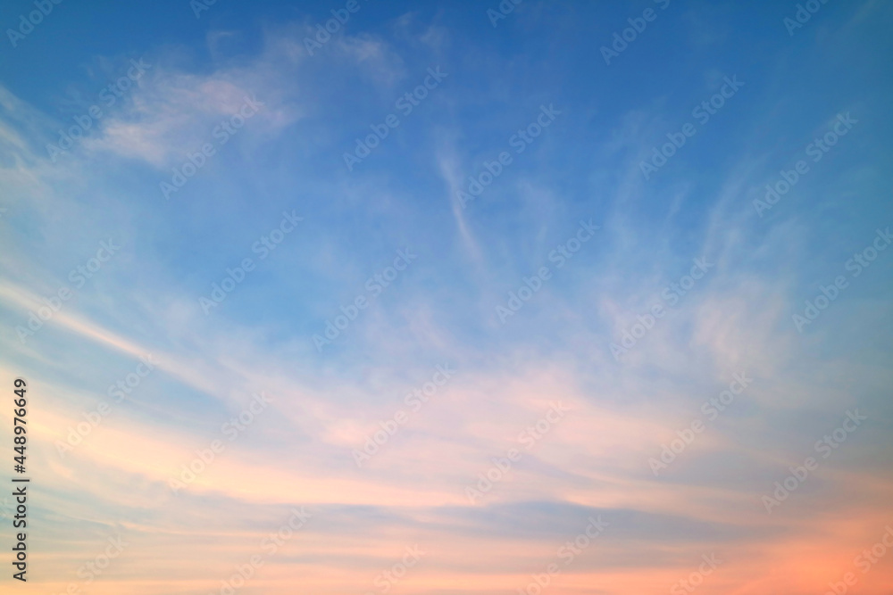 Cirrus Clouds on Sunset Sky with Pastel Color Afterglow