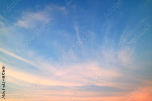 Cirrus Clouds on Sunset Sky with Pastel Color Afterglow © jobi_pro