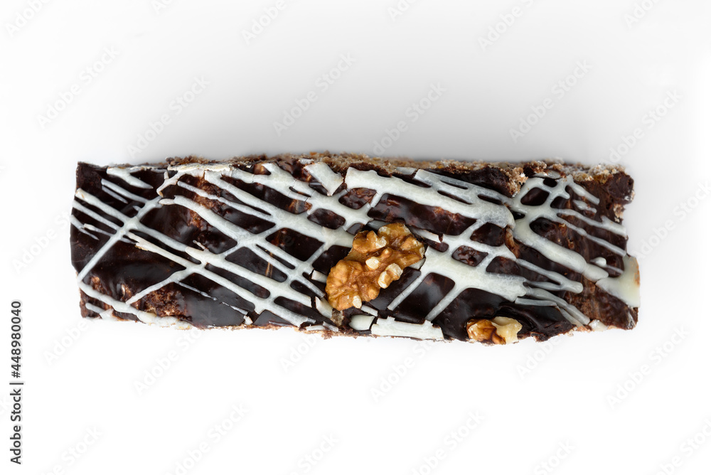 Slice of chocolate cake isolated on white background.