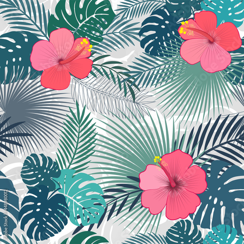 Seamless pattern with hibiscus flowers and tropical palm leaves. © Владимир Спиридонов