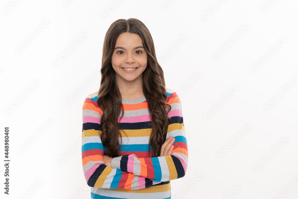 Stylish and confident. Confident girl isolated on white. Child model wear striped sweater Stylish and confident. Confident girl isolated on white. Child model wear striped sweater