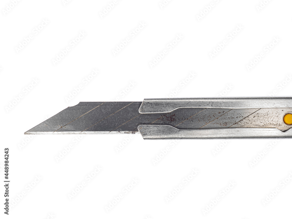 old cutter knife close up on white background old cutter knife close up on white background