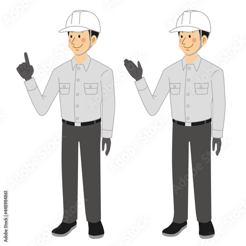 紹介＆説明ポーズをする工事現場の男性