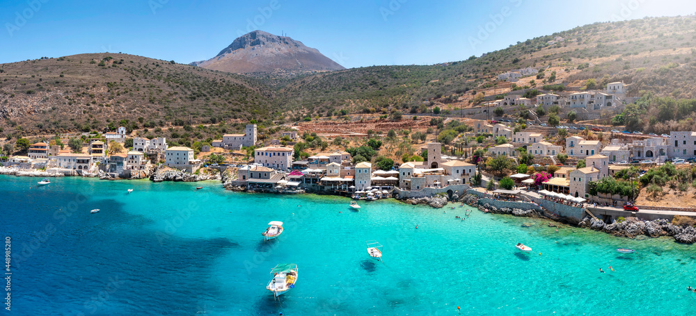 Panoramic aerial view to the beautiful village Limeni on the south Mani coast, Peloponnese, Greece, with shining, turquoise sea during summer time