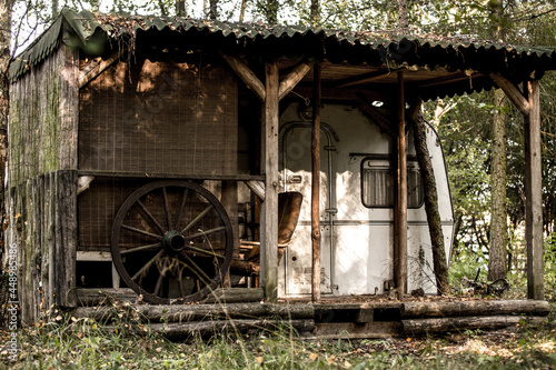 An old abandoned caravan trailer in the woods changed to a house