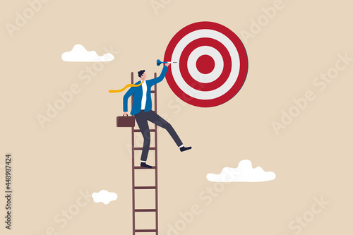 Success ladder, aspiration to achieve target, business goal or work purpose, aim for perfection concept, businessman climb up ladder high into the sky to aiming for perfect bullseye target dartboard.