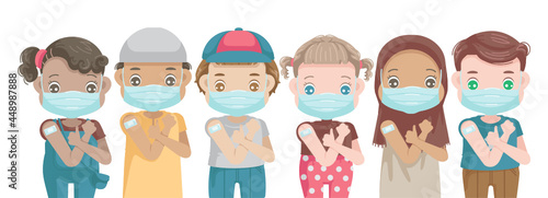 Chiden in face mask gesturing thumb up. Open shoulders for vaccination after receiving covid-19 vaccine injection. Kid approving of coronavirus immunization concept.