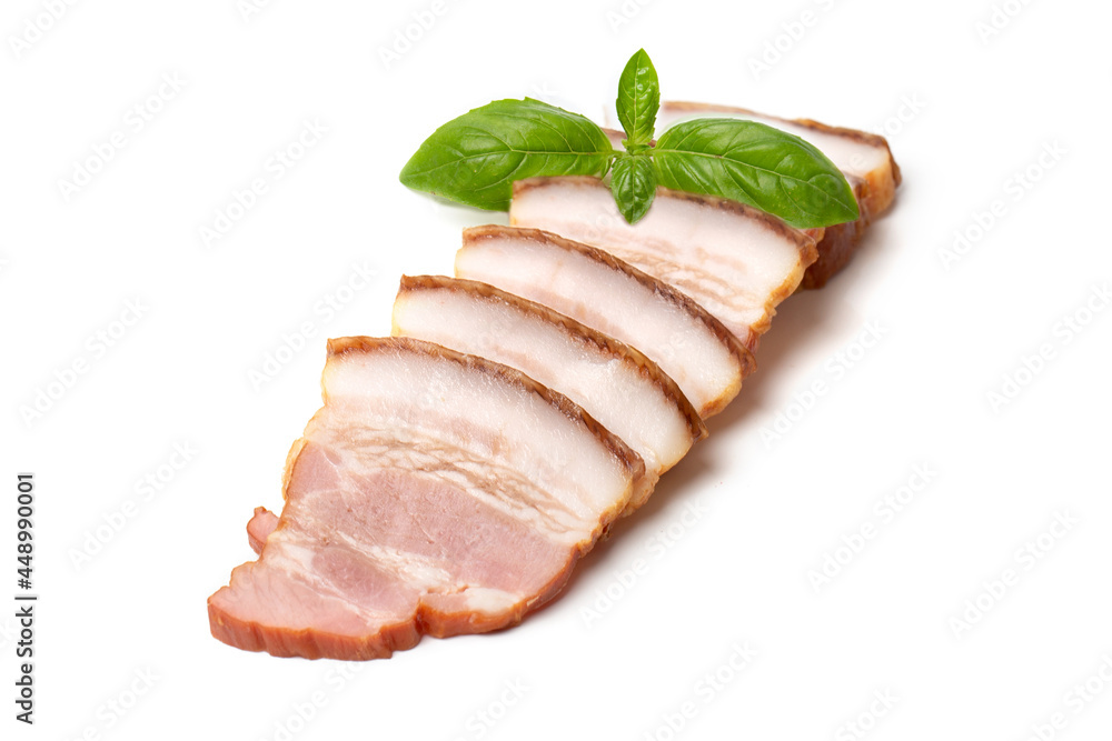 Smoked brisket pork loin decorated green basil leaf, isolated on white background. High resolution image. Smoked brisket pork loin decorated green basil leaf, isolated on white background. High resolution image.