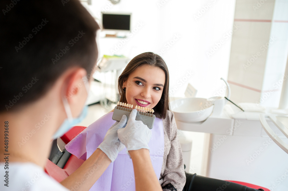 Check and select the color of the teeth for beautiful girl. Check and select the color of the teeth for beautiful girl.