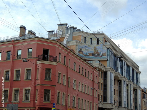 The architecture of buildings in St. Petersburg, an old unified building. Beautiful houses of St. Petersburg. The urban landscape created under Peter the Great.