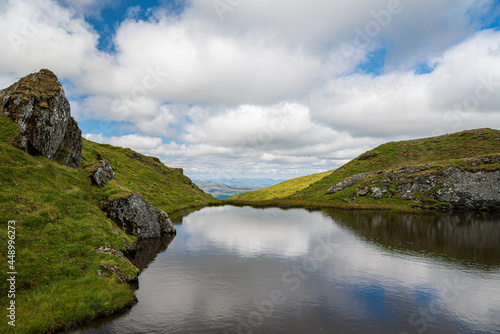 Landscape photography of mountains, hiking, trekking, lake, clouds, Tarmachan ridge, Scotland photo