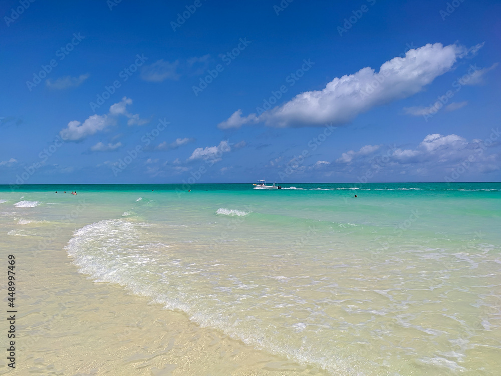Cayo Guillermo, Cuba, 16 may 2021: People swim in the azure waters of the white Pilar beach on the island Cayo Guillermo. Playa Pilar is very popular with tourists.