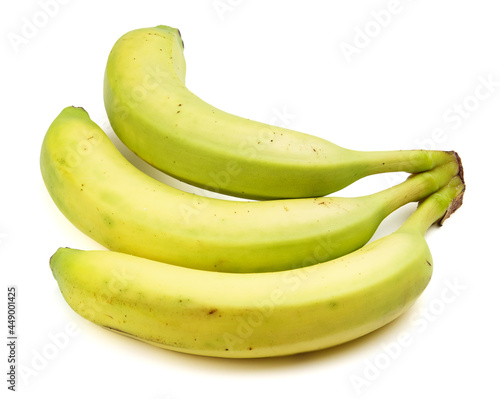 Three bananas close-up on a white background.