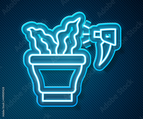 Glowing neon line Spraying a house plant with a spray gun icon isolated on blue background. Moistening of foliage. Care for home flowers. Vector