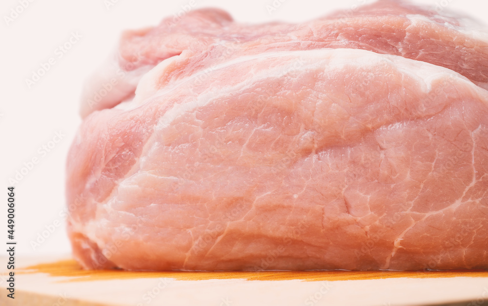 One piece of pork and white background. One piece of pork and white background.