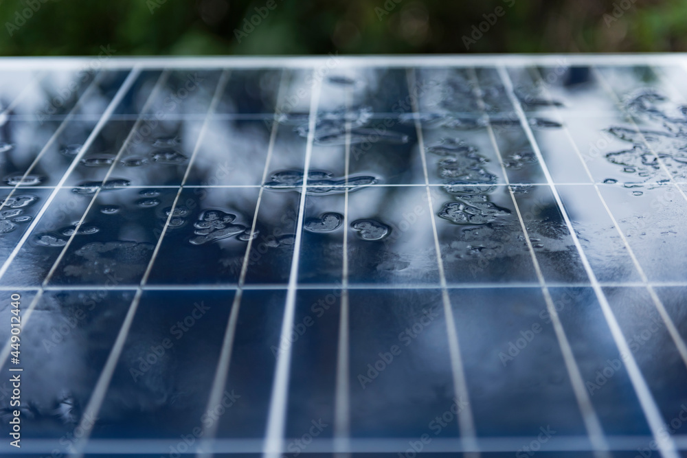 Foto de Solar panel with rain drops on a nano coating. Renewable energy