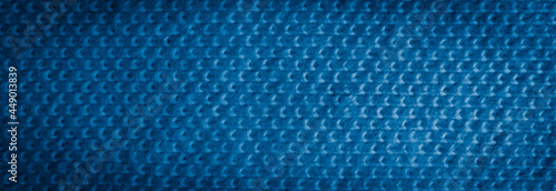 blue cotton fabric with visible details. background or texture