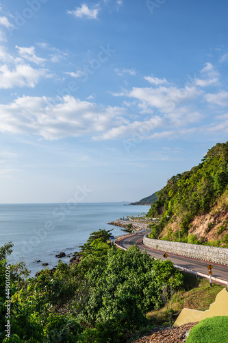 Fototapeta Naklejka Na Ścianę i Meble -  Beautiful seascape view with the mountain at noen nangphaya viewpoint chanthaburi thailand.Popular waterfront photo spot with a backdrop of the curving coastal road