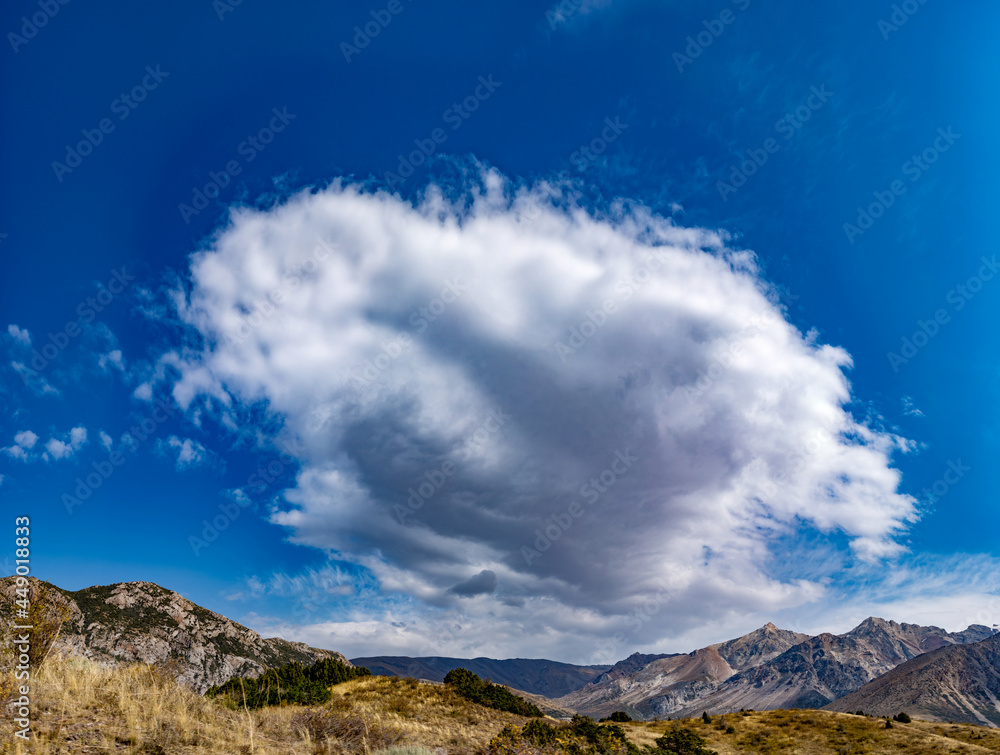 a cloud over the mountains in Sairam-su a cloud over the mountains in Sairam-su