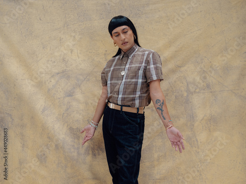 A portrait of a non-binary Latinx person 