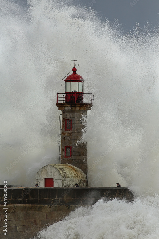 Big waves against lighthouse