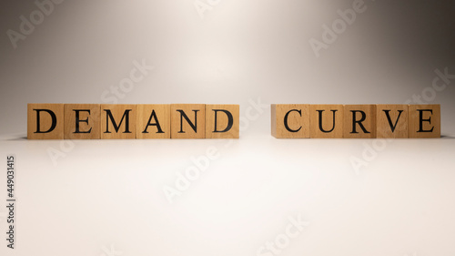 The name Demand Curve was created from wooden letter cubes.