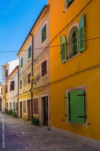 A quiet back street in the historic medieval coastal town of Porec in Istria, Croatia  © dragoncello
