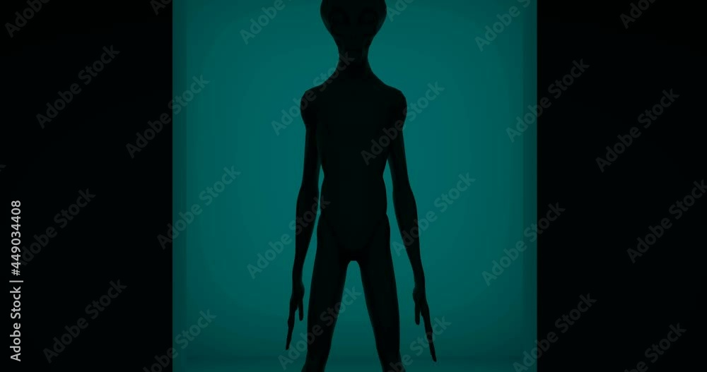 Silhouette of Grey Alien revealed in backlight Silhouette of Grey Alien revealed in backlight