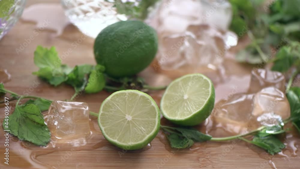 Lime composition with ice and glasses, green mint Lime composition with ice and glasses, green mint