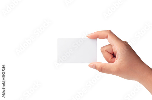 Closeup of female hand holding a plastic credit card, blank white credit card isolated on white background.Template of white blank credit card for your design, File with clipping path so easy to work.