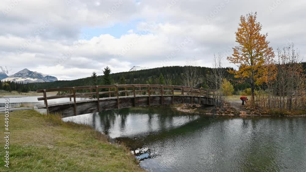 Cascade ponds with wooden bridge in autumn public park at Banff national park Cascade ponds with wooden bridge in autumn public park at Banff national park