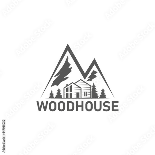 Logo wood house and Mountains. Sign wood house for rental.