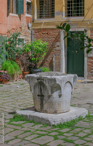 Venetian stone ancient well, Venice, Italy