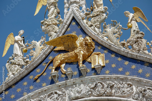 Gold Lion on the facade of the St. Mark's Basilica, Venice, Italy