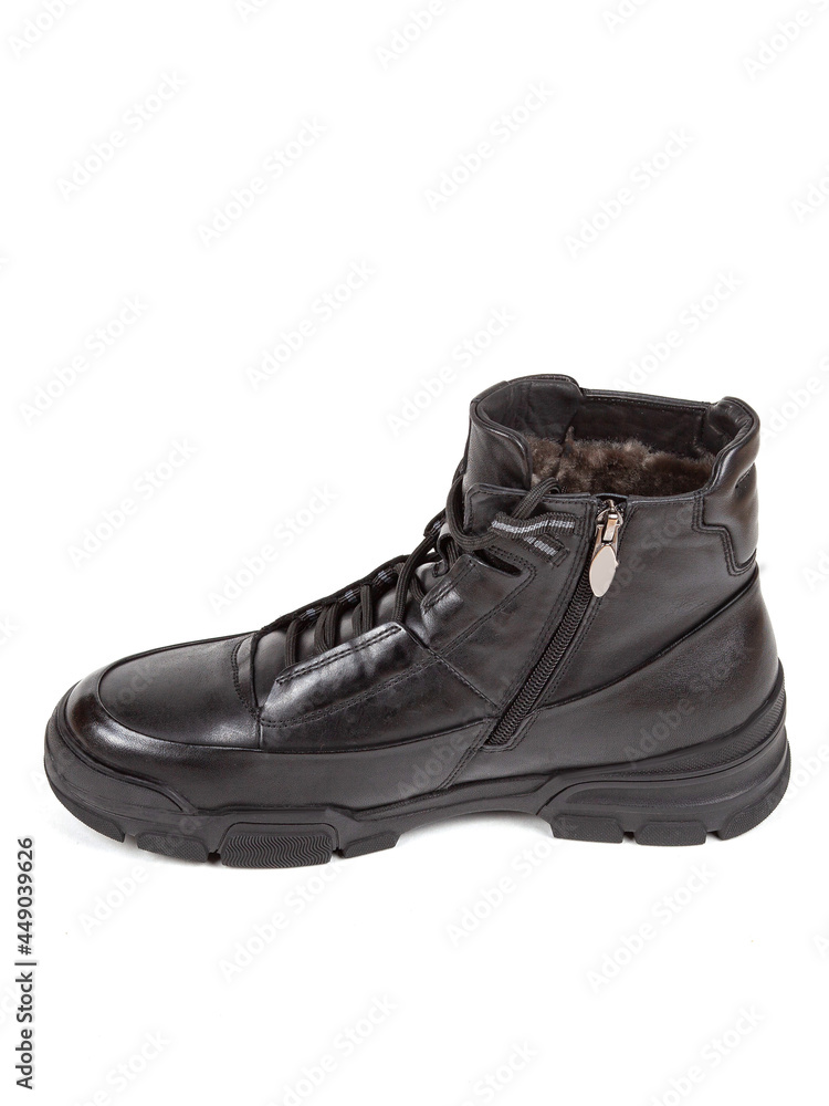 Classsic new men's black winter leather fur boots isolated on white background Classsic new men's black winter leather fur boots isolated on white background