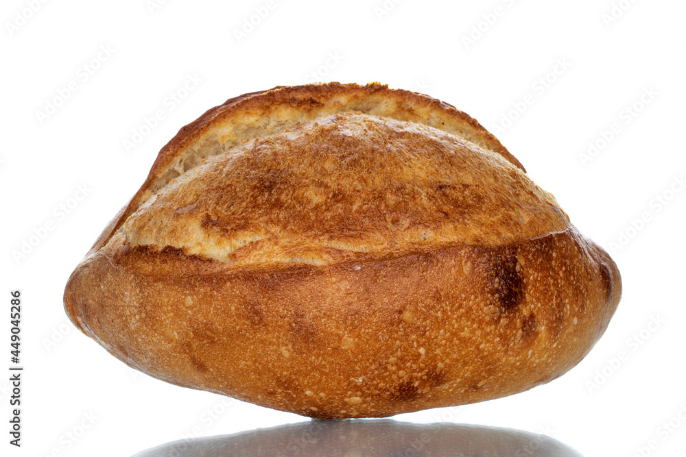 One loaf of aromatic white bread, close-up, isolated on white. One loaf of aromatic white bread, close-up, isolated on white.