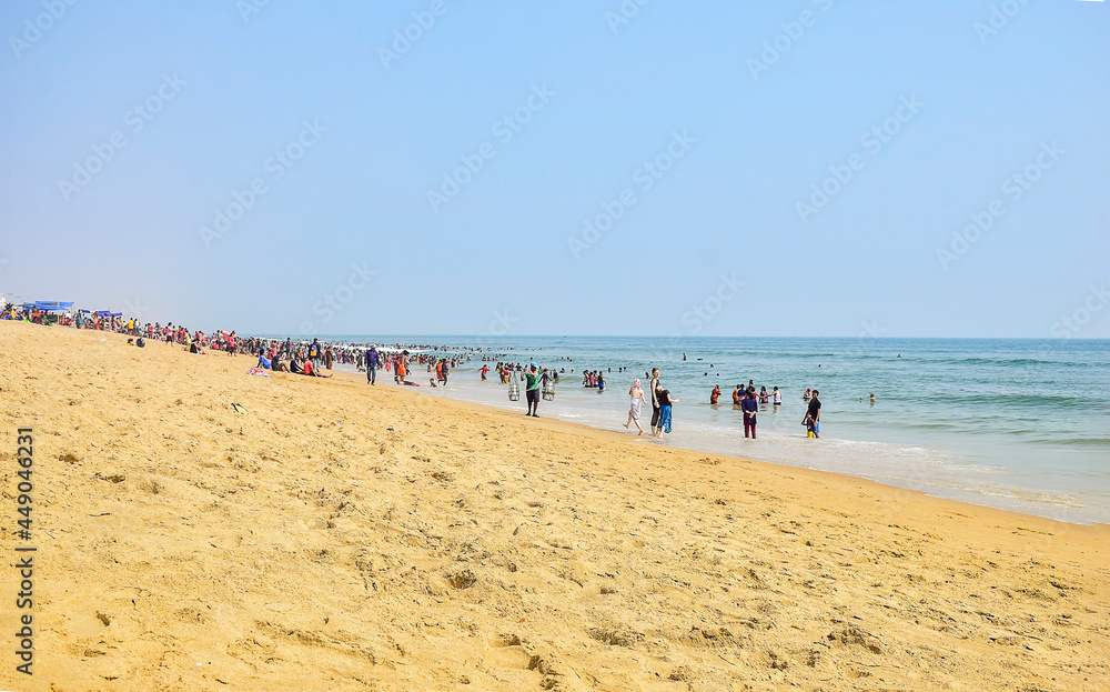 People enjoyeing beach life of Puri beach in eastern India a holy place to have fun. February 2020. People enjoyeing beach life of Puri beach in eastern India a holy place to have fun. February 2020.