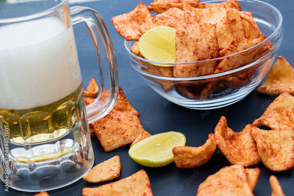 Having a snack and beer Having a snack and beer