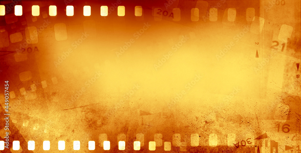 Orange filmstrip frames background. Copy space