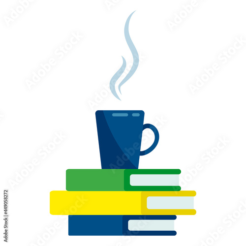 a cup of hot drink on a stack of books