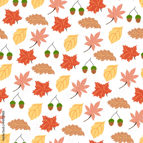 Seamless pattern with autumn maple and oak leaves and acorns.