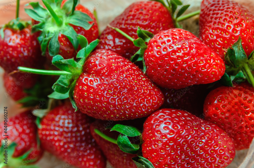 Lots of red ripe strawberry close-up macro Lots of red ripe strawberry close-up macro