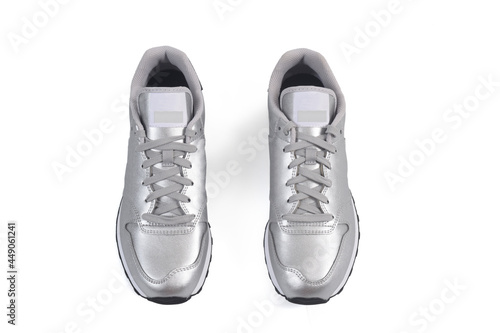 overhead view of some sports shoes on white background