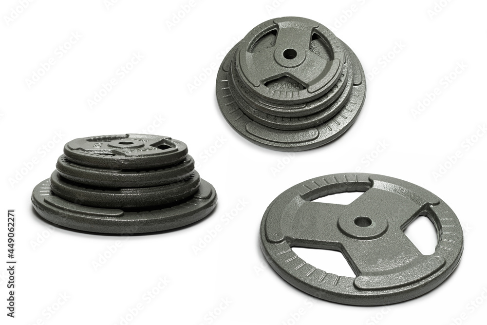 Weight plates isolated on a white background. Weight plates isolated on a white background.
